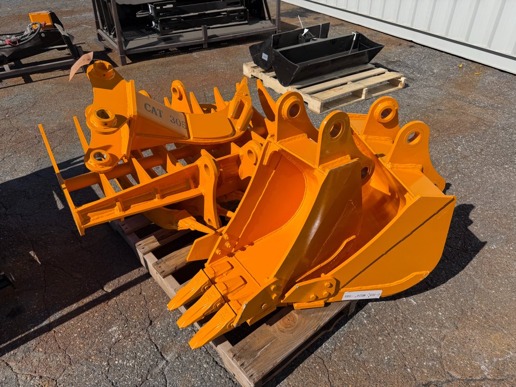 New Skid Lot Of Excavator Attachments