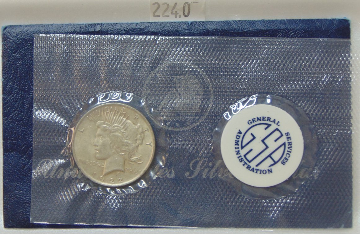 1922 GSA Peace Dollar in plastic and envelope.