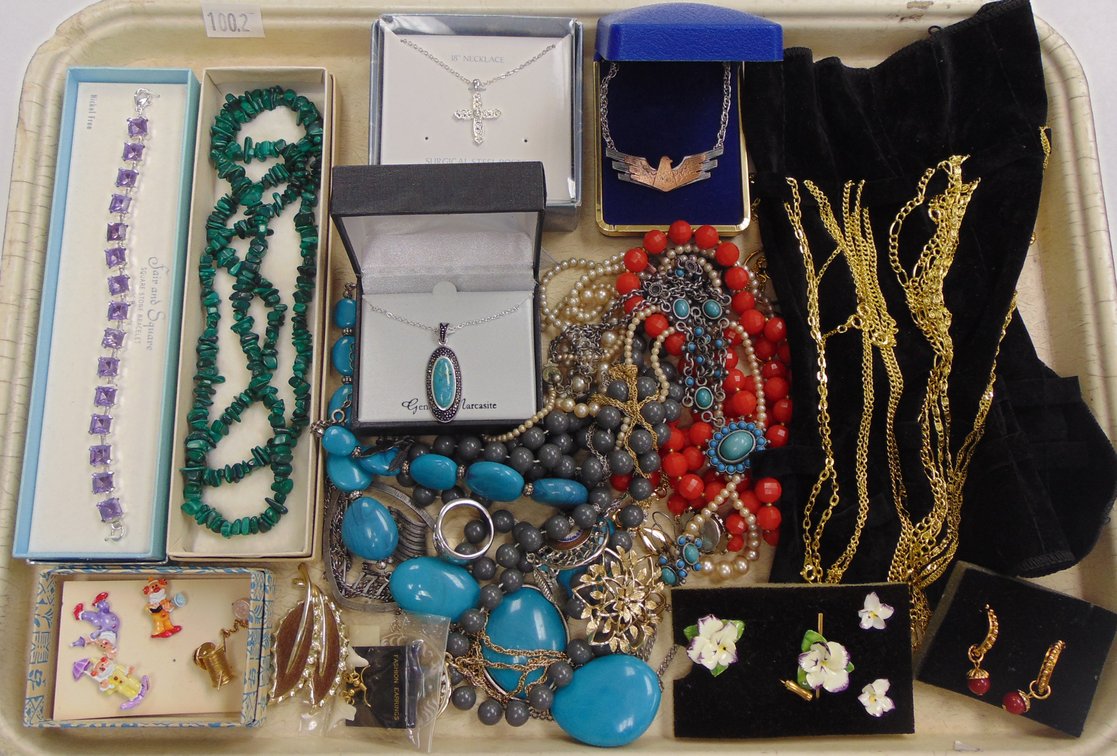 Variety of Necklaces, Earrings and Pins.