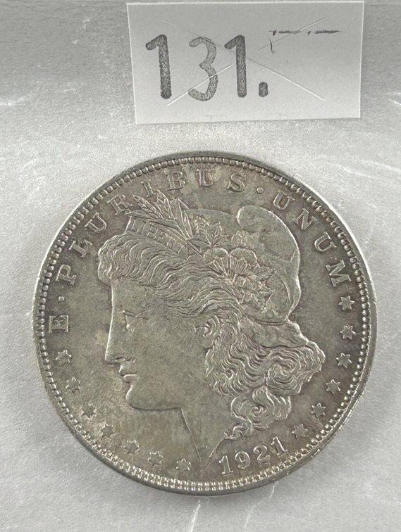 1921 Morgan Dollar EF-AU (last year).
