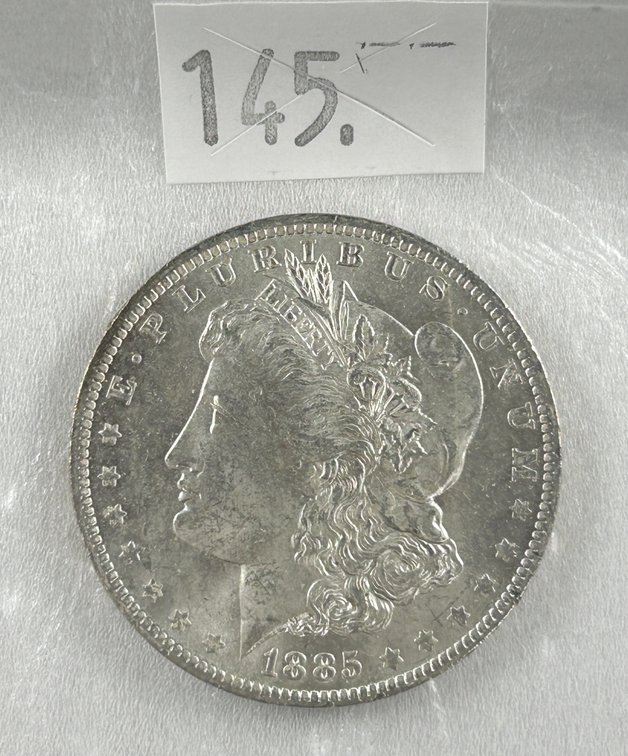 1885-O Morgan Dollar AU.