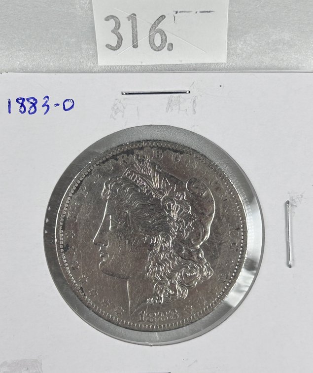 1883-O Morgan Dollar AU.