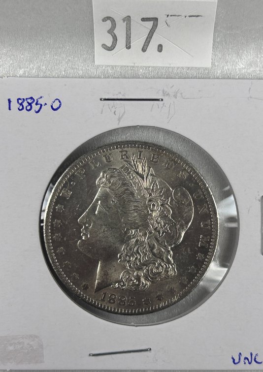 1885-O Morgan Dollar AU.