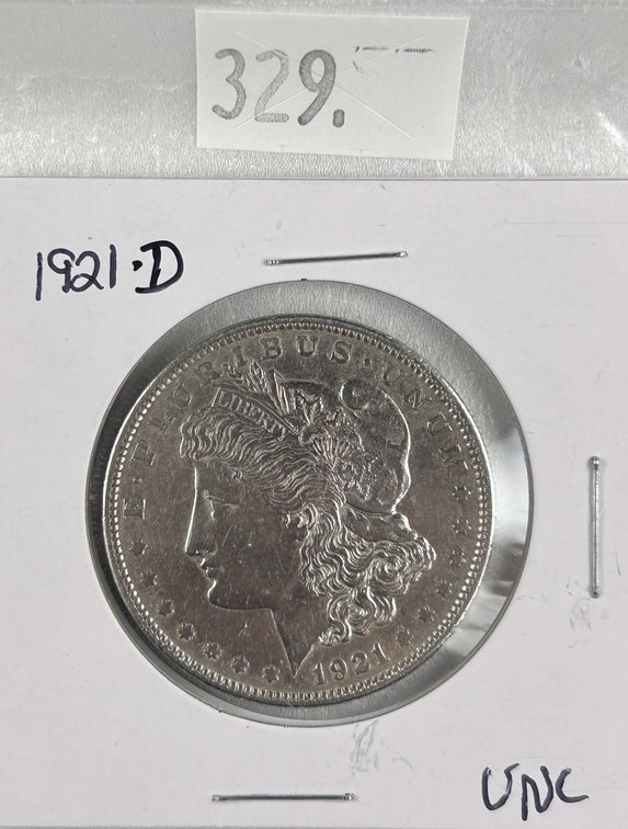 1921-D Morgan Dollar UNC (last year).