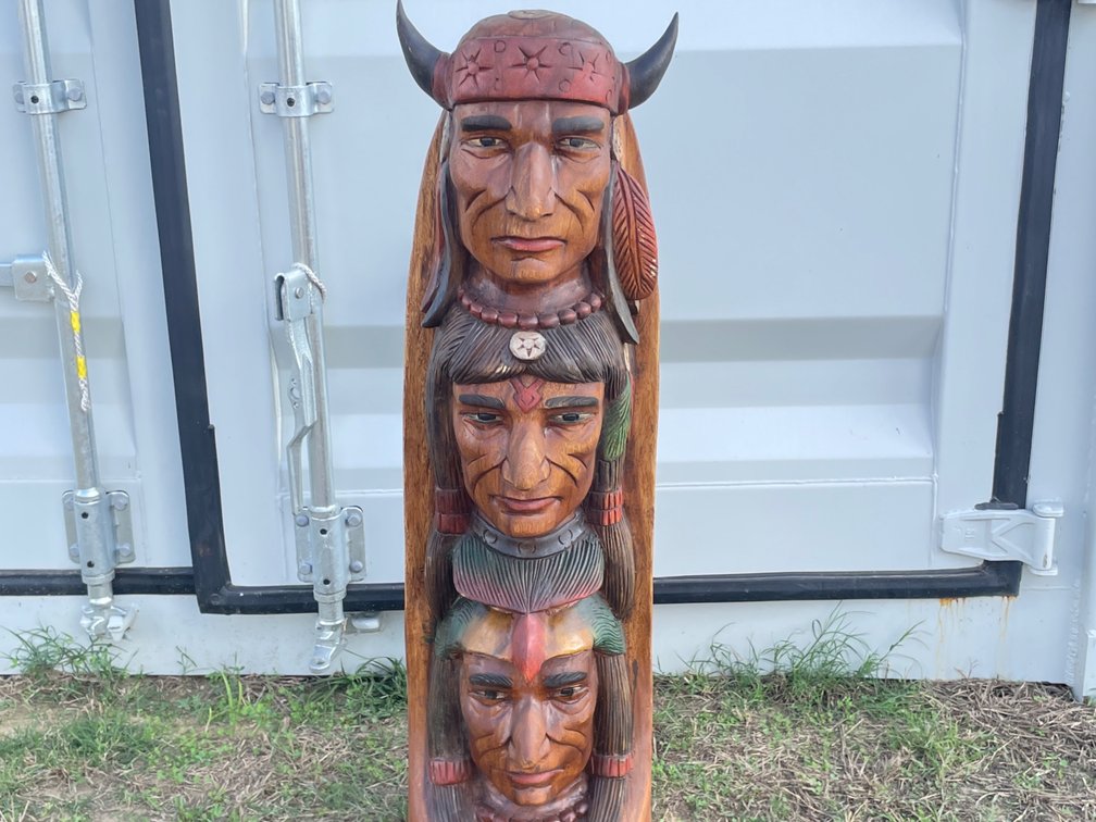 Three headed totem pole