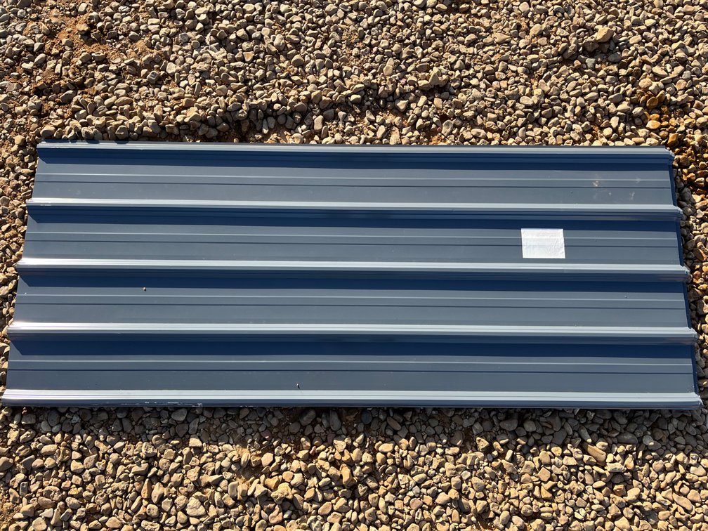 Grey metal roof panel