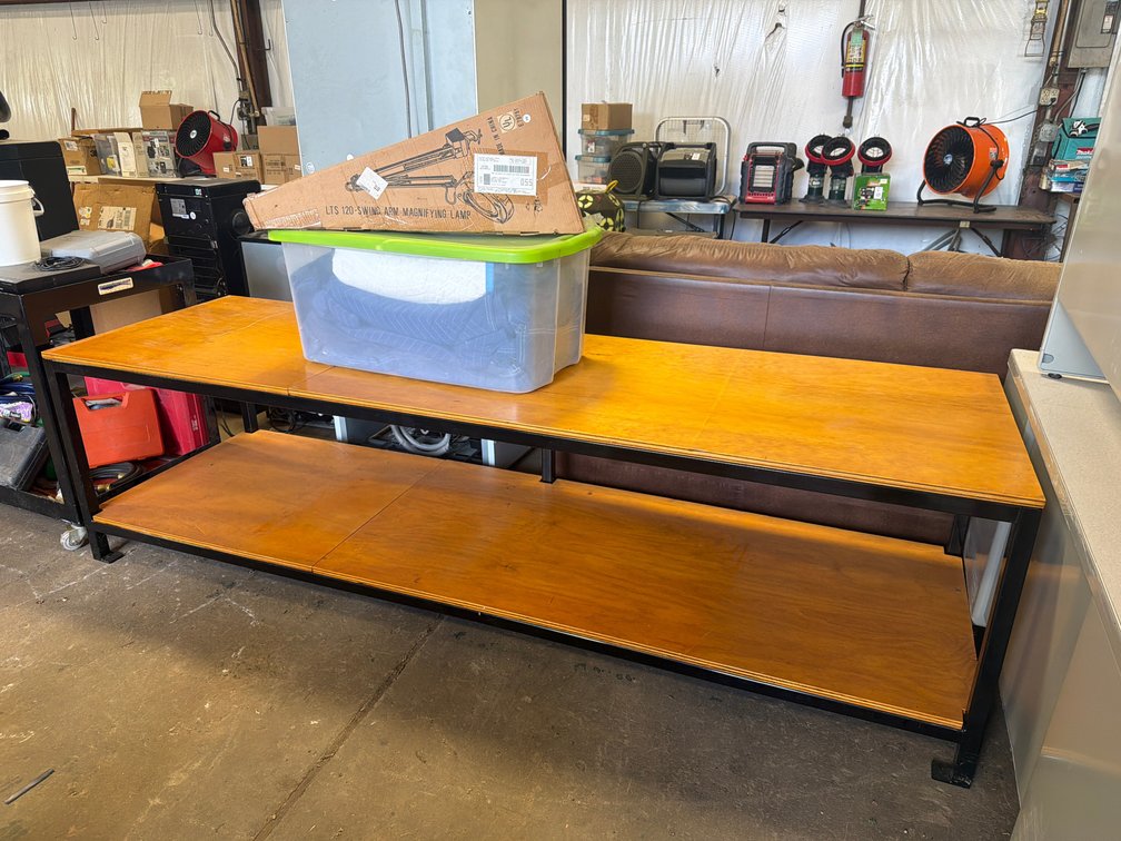 Two-Tier Industrial Workbench, Swing Arm Magnifying Lamp, and Moving Blankets