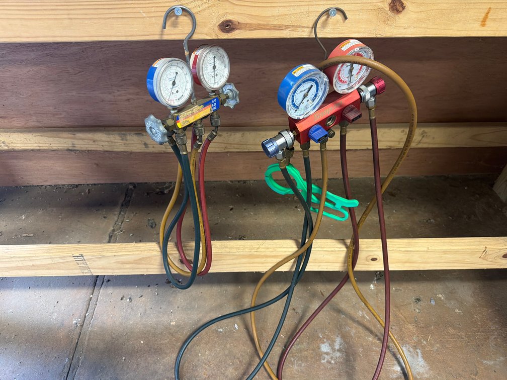 Two A/C Manifold Gauge Sets