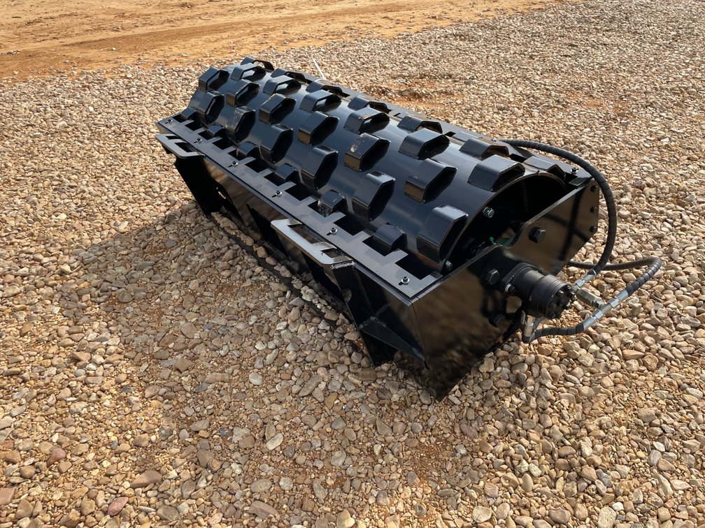 Skid steer roller