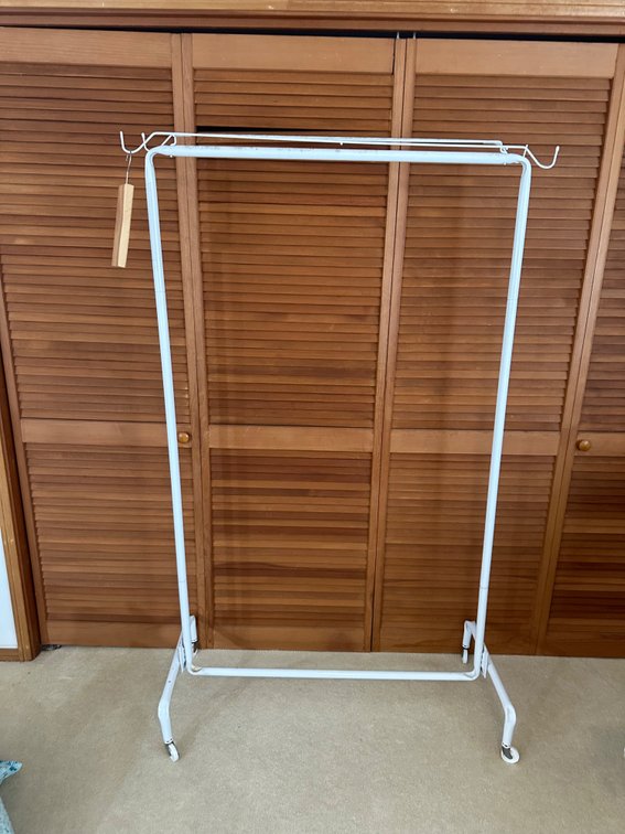 67" Tall White Metal Rolling Clothing Rack 
