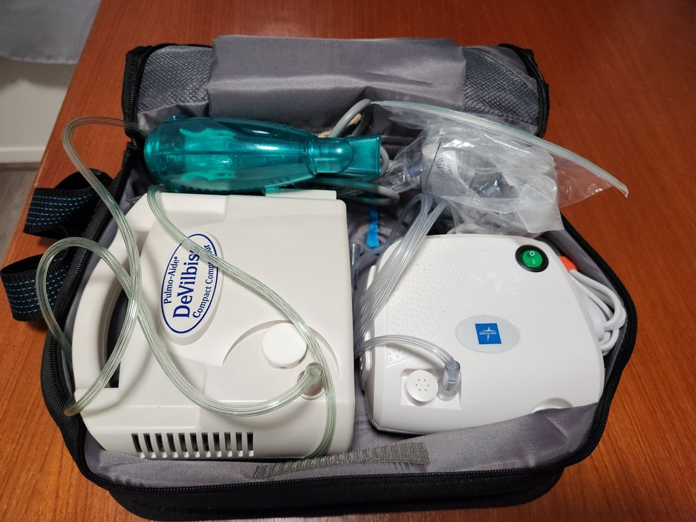 Nebulizer and portable oxygen concentrator with carry case.