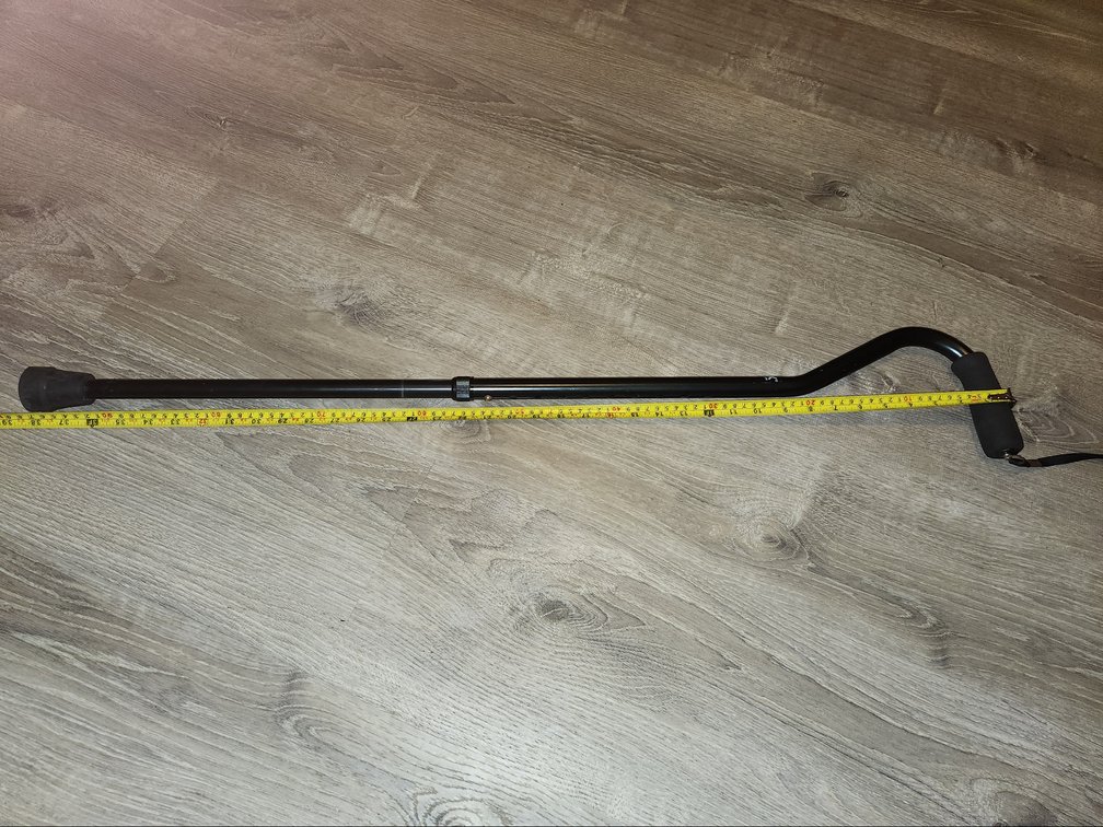 Adjustable walking cane