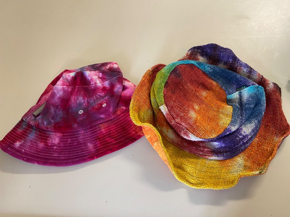 Two adult size tie-dyed hats