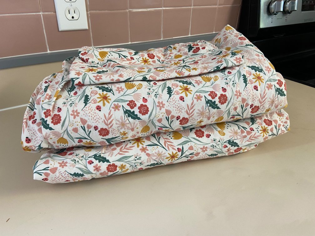 Set of multicolored, floral, print twin sheets w/ 1 standard size pillowcase