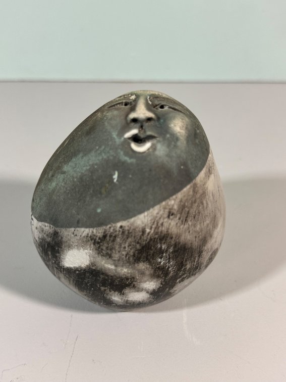 Handcrafted Rattle Face Sculpture