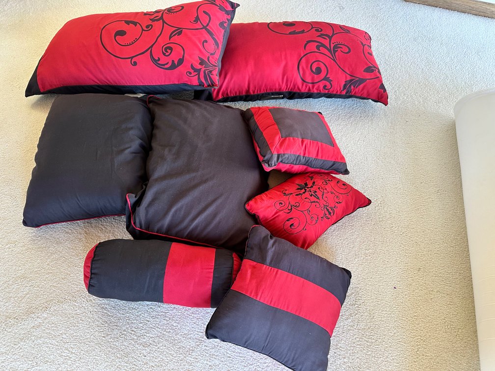 Set of Decorative Red and Black Throw Pillows with Elegant Designs