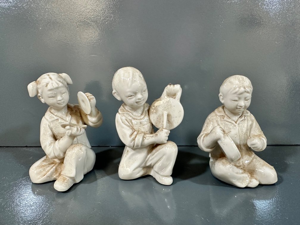 Charming Trio of Porcelain Figurines: Children with Musical Instruments