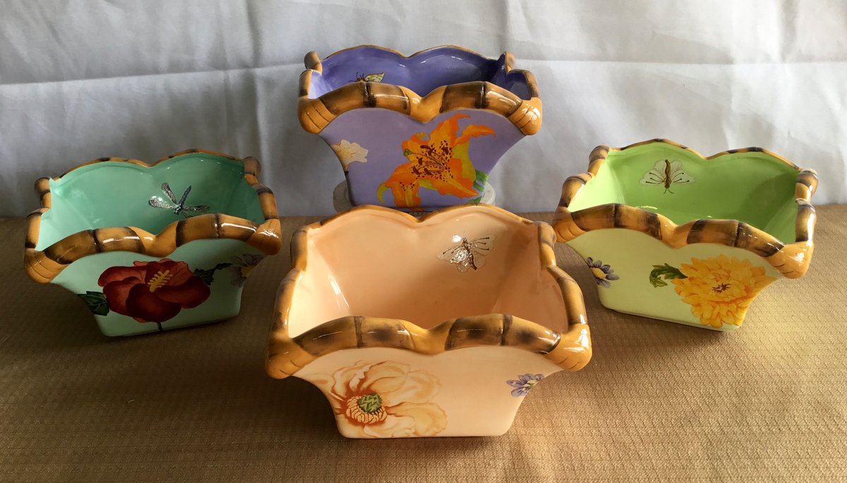 Four Decoupage square bowls