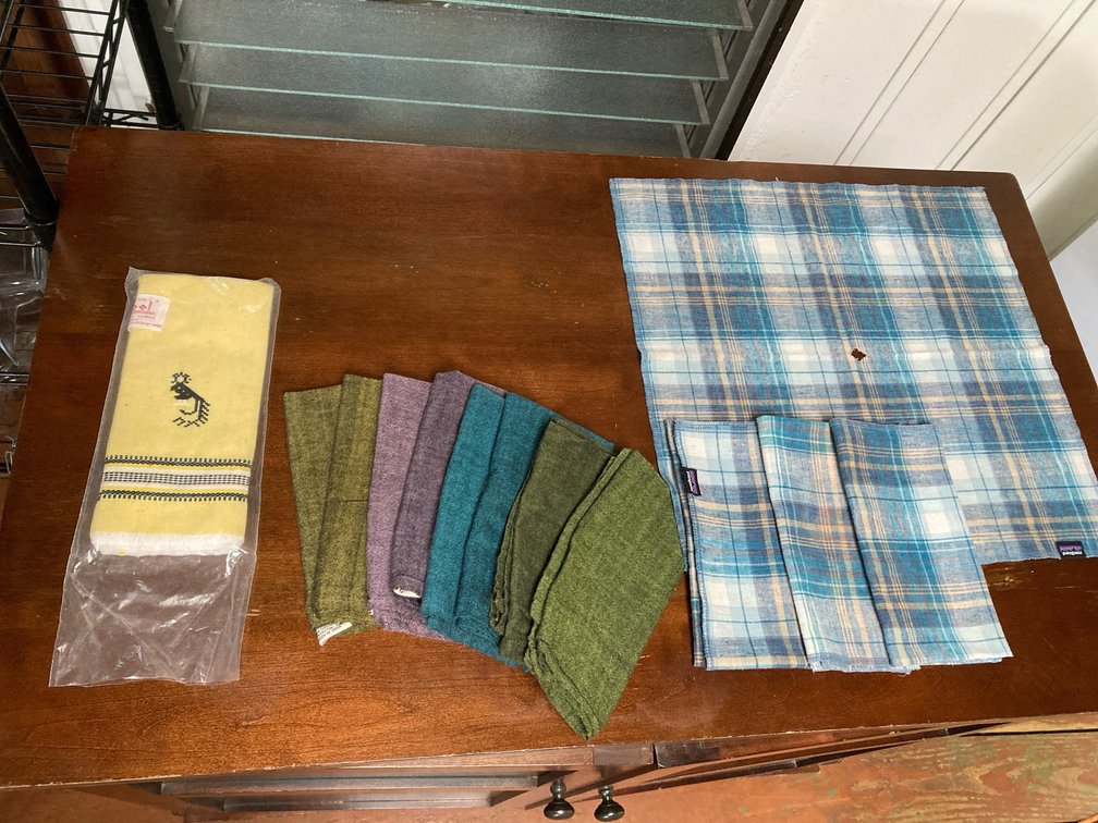 Three Natural napkin sets, incl Patagonia 