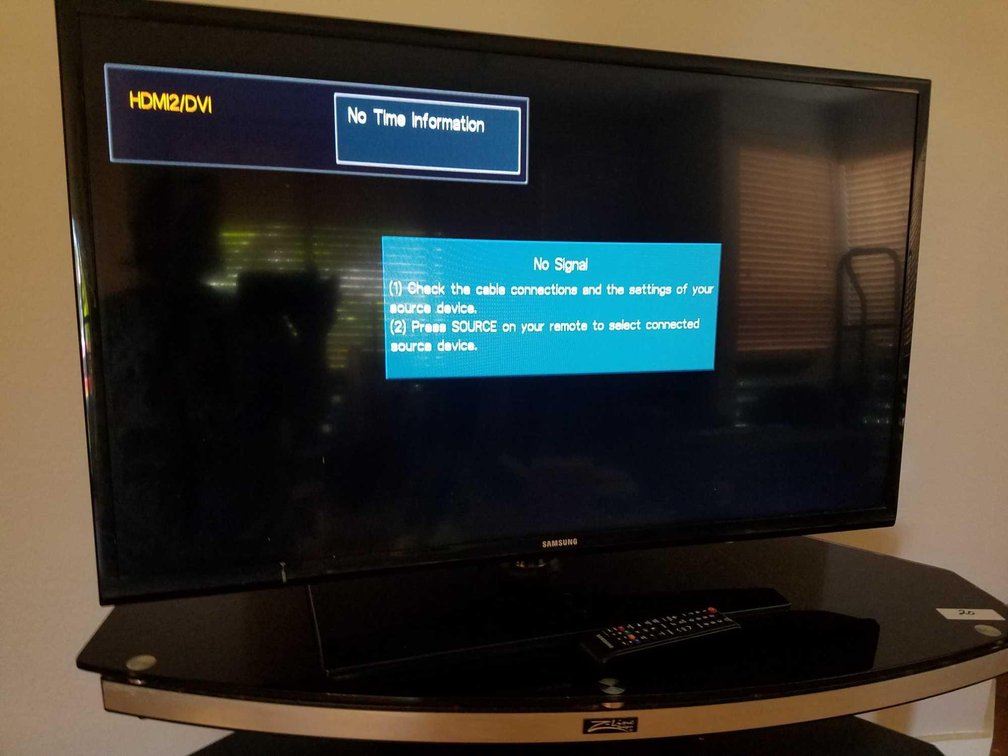 Samsung 40" TV.  No cable here, but picture shows it powers up.  With remote
