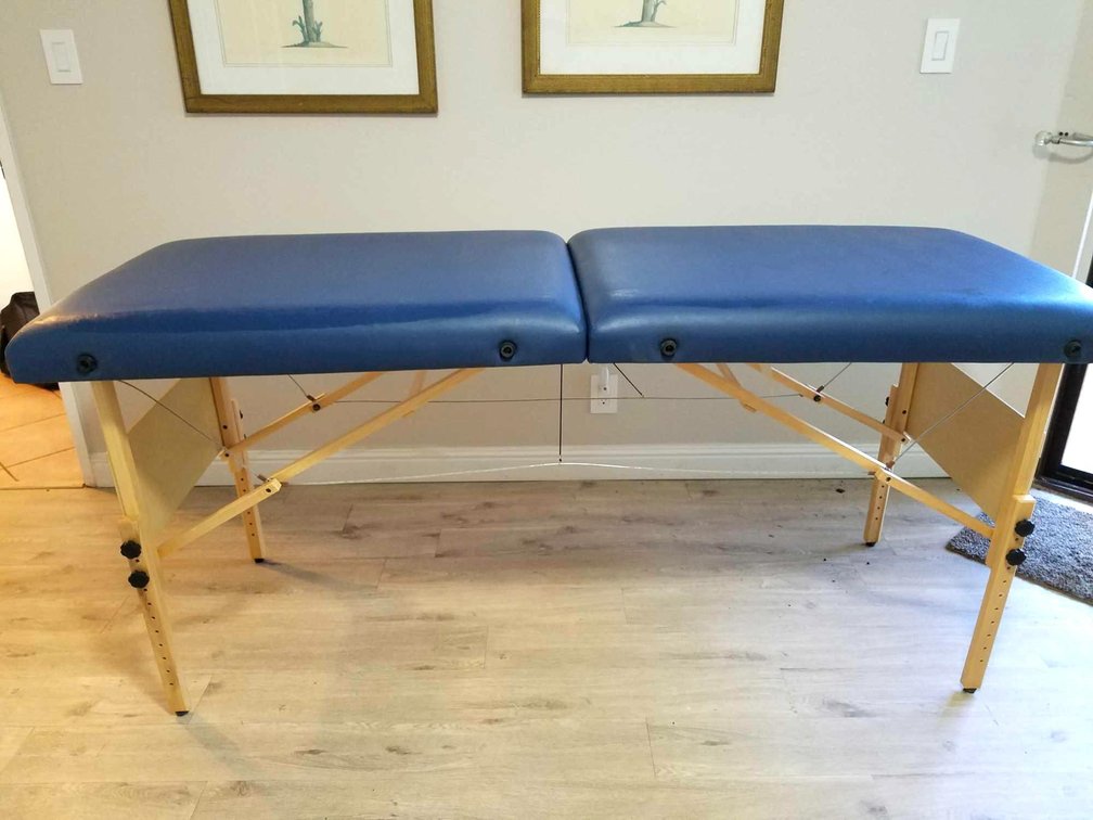 Like NEW full size travel massage table.  Folds compact to fit in carrying case.