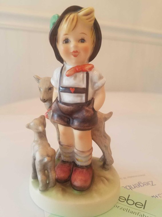 M. I. Hummel. Goat Herder #834.  Pristine condition, still in box.