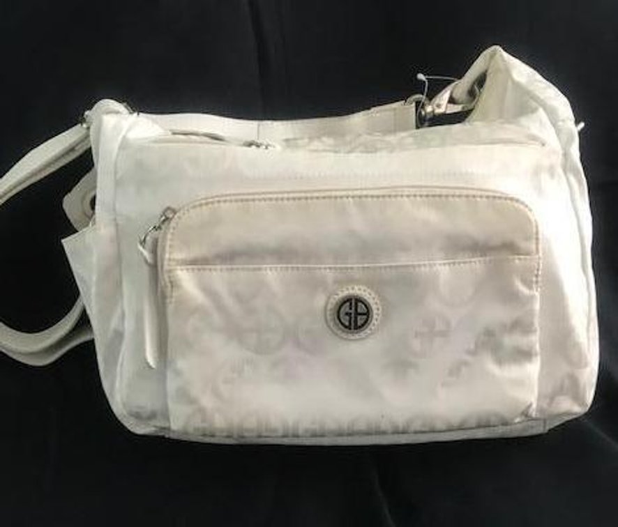 Giani Bernini Shoulder Bag.  Never used.  Slightly yellow on some places from being stored.  