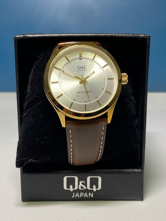 Q & Q Japan Brand Water Resistant Watch with Brown Band