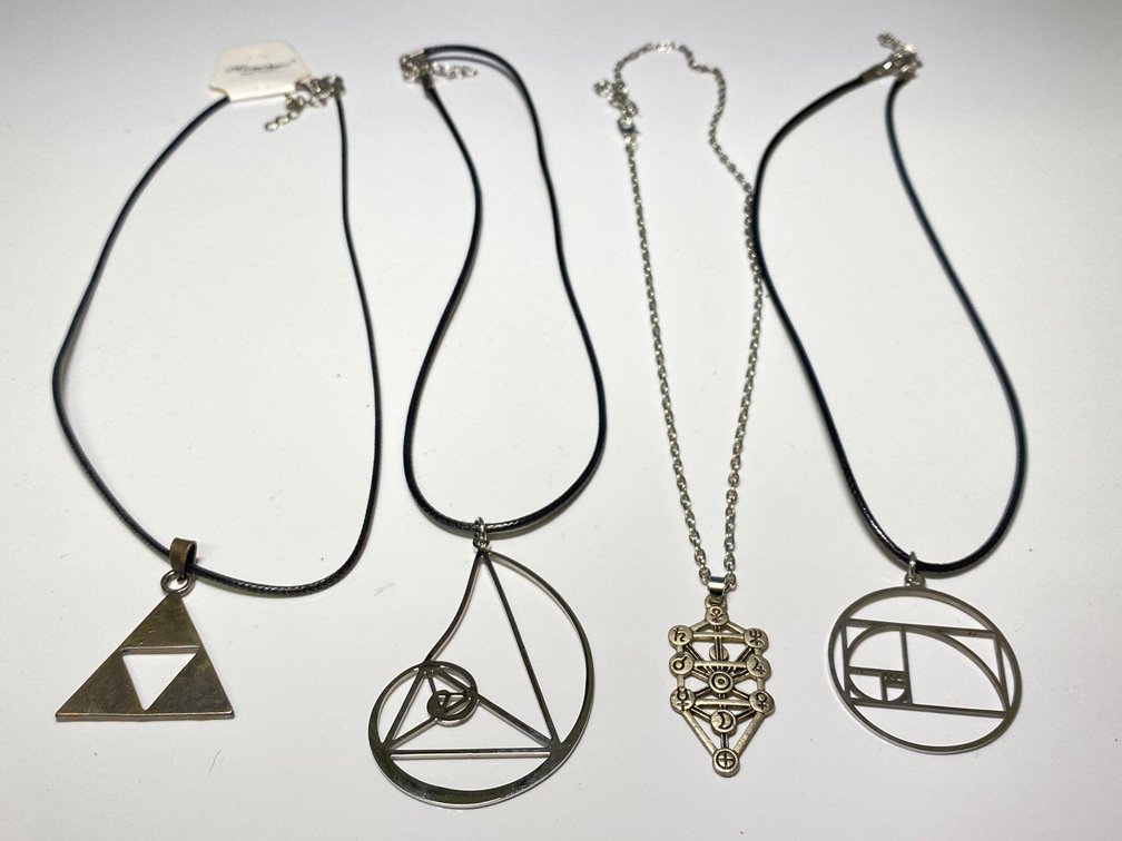 Four Large Pendant Necklaces 