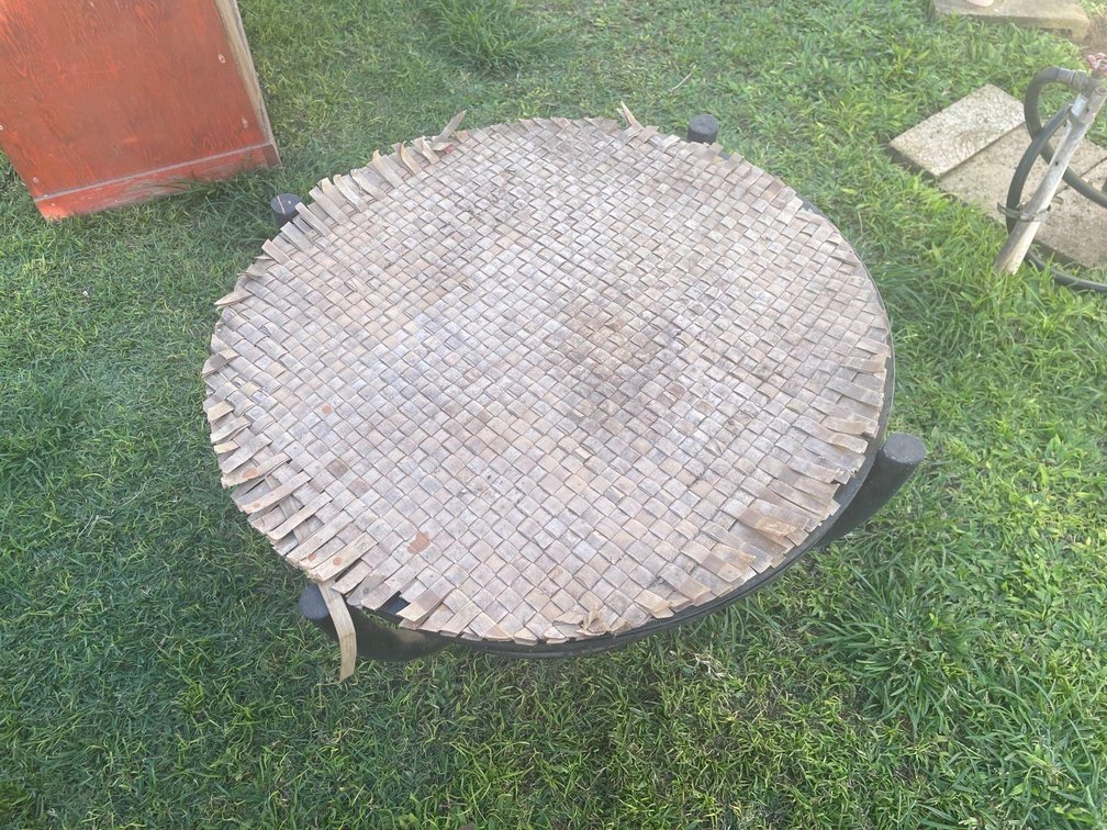 Glass table with woven table cover
