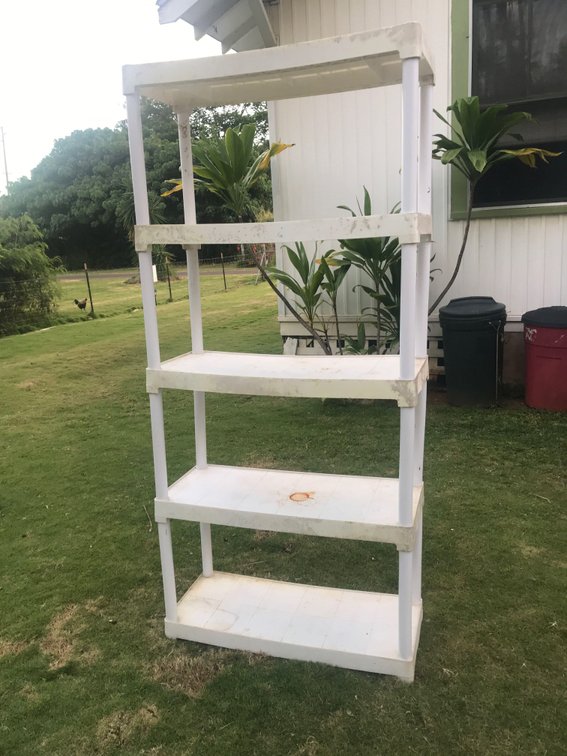 5 tier plastic shelving unit and 5 tier wooden bookshelf unit