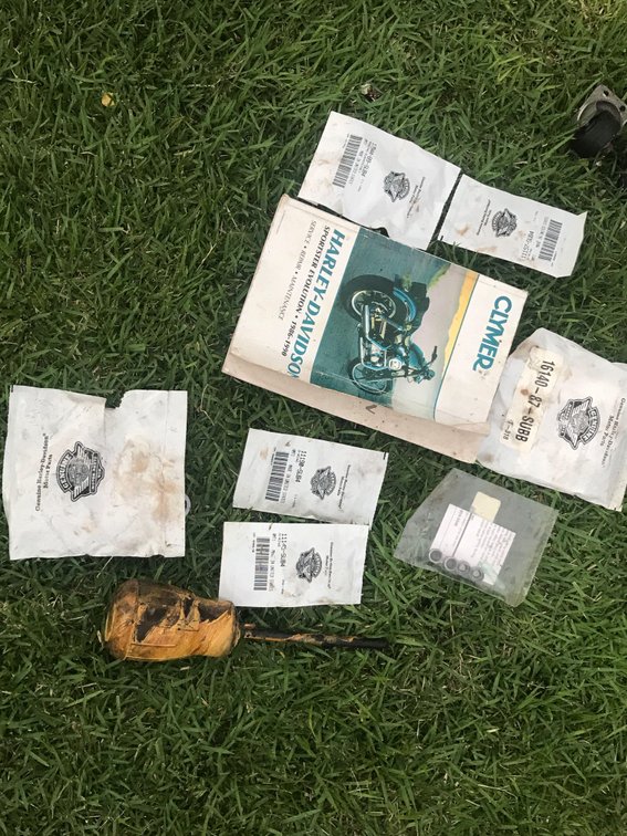 Harley Davidson books and parts lot