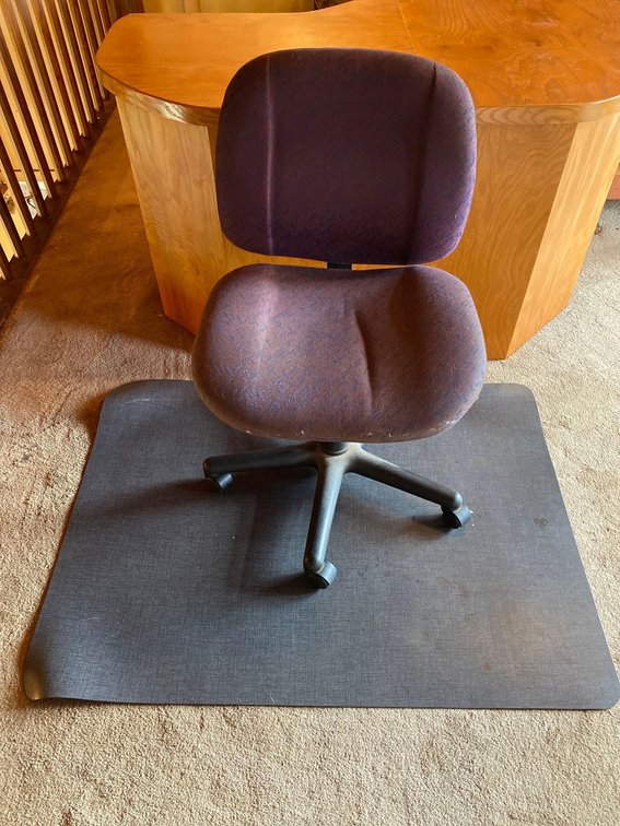 Rolling Office Chair and Plastic Desk Mat