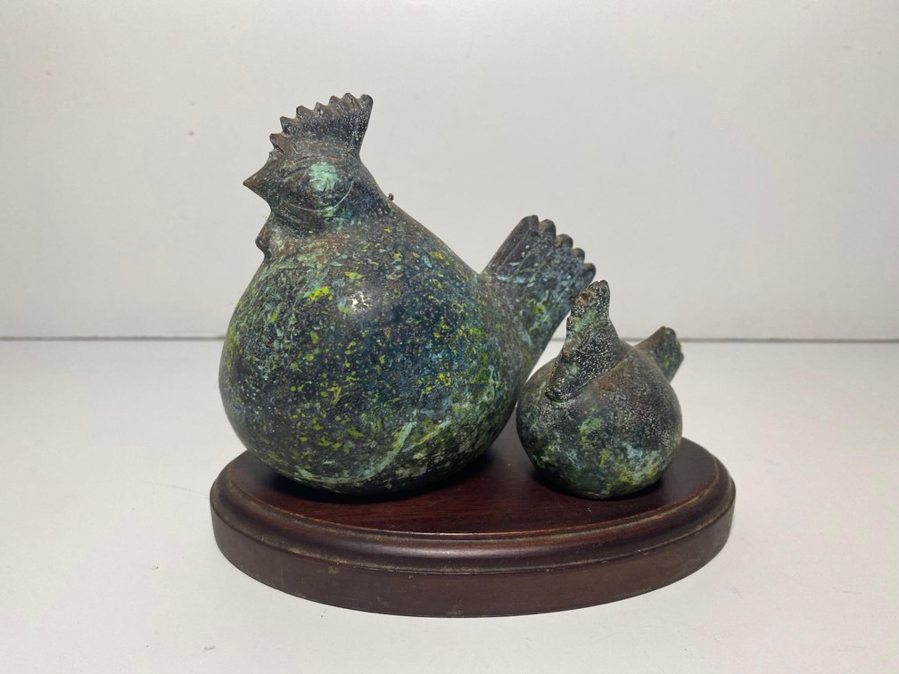 Metal Chicken and Chick Decor on Platform 