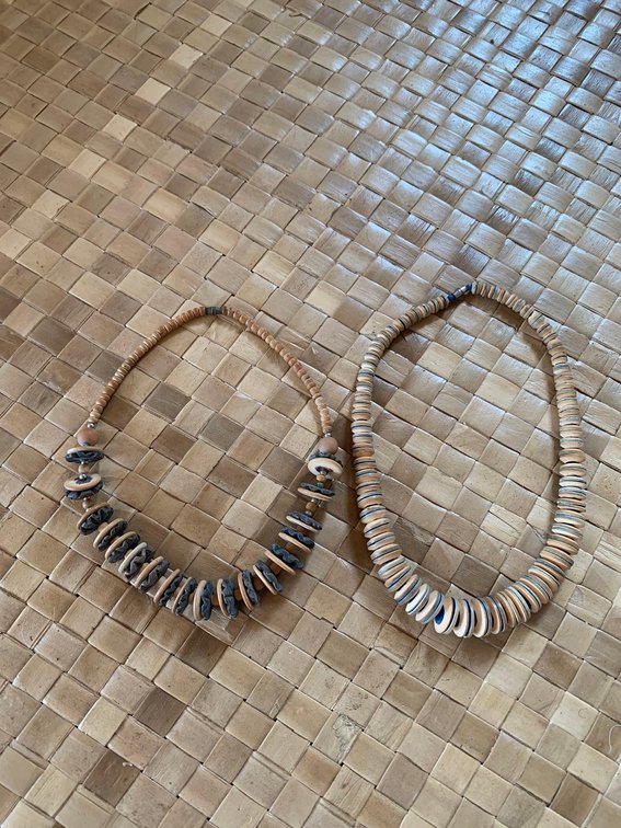 Two wood-bead necklaces