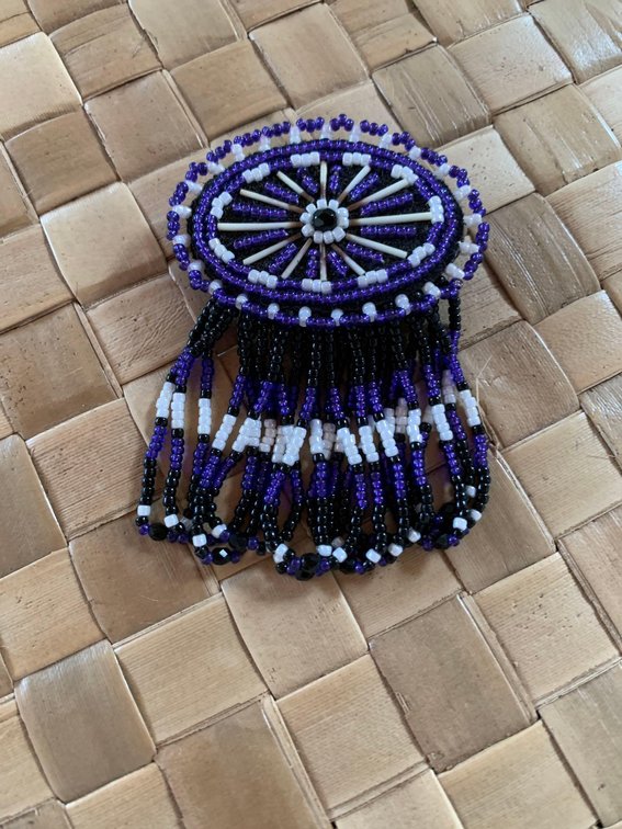 Purple and white beaded pin