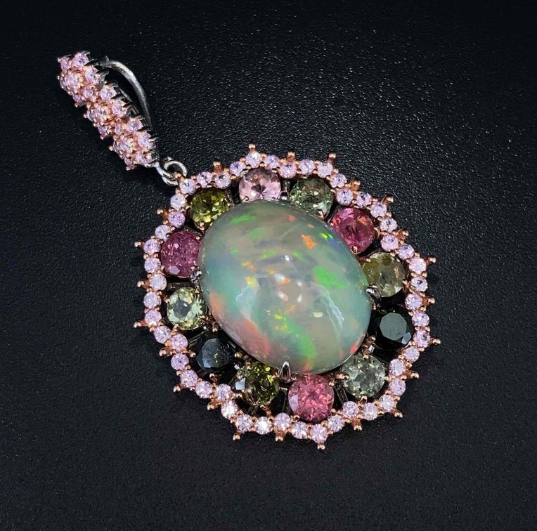 Natural Opal 8.10 Center Stone Surrounded by Natural Sapphires Pendant 