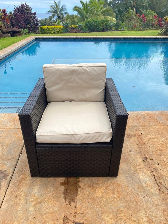 Outdoor Patio Arm Chair with Light Colored Cushions 
