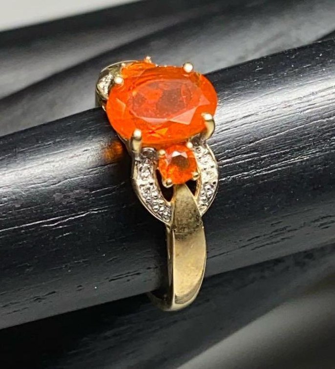 10K Gold 1.14ctw Red Fire Opal and .02ctw Diamond  Chips Ring Size 9