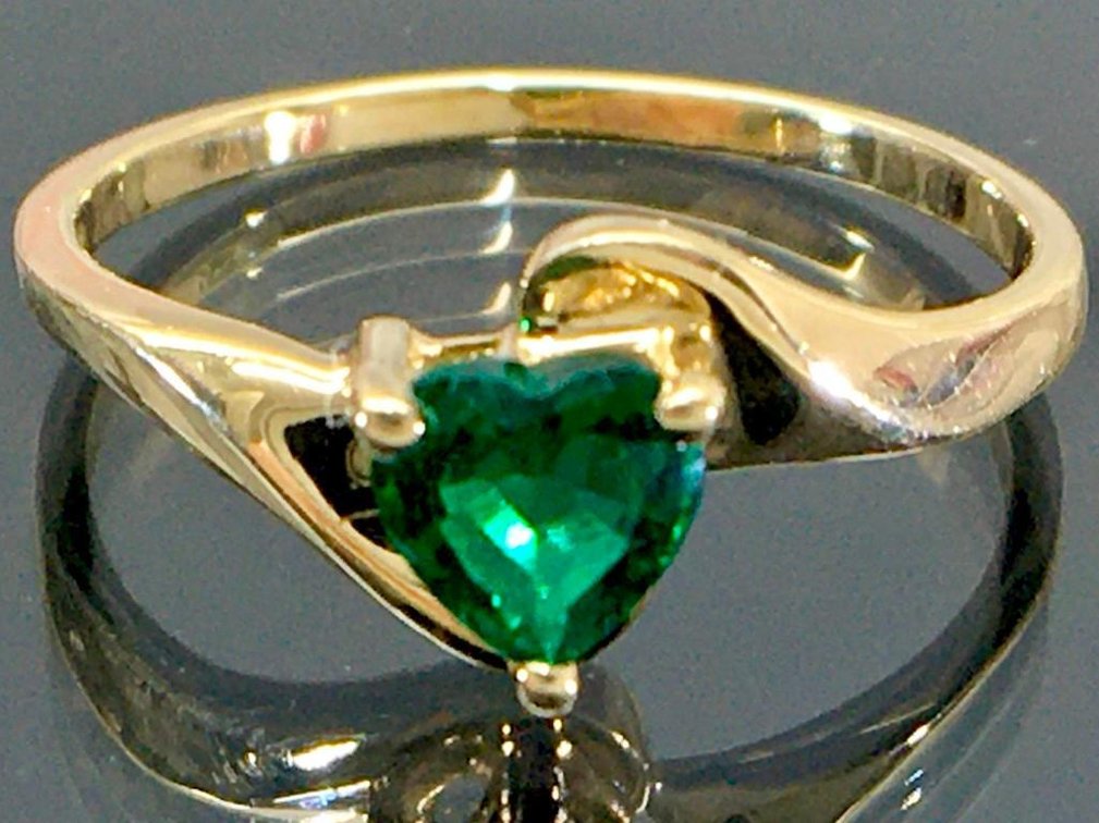 10 Karat Fine Gold Ring with Heart Cut Emerald Center is Estimated at Half Carat. Items Tested with 
