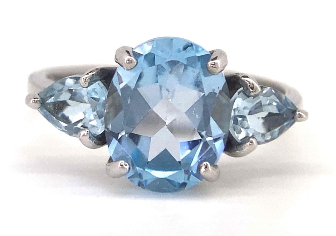 Large Intense Blue Topaz Center Stone With Pear Shaped Blue Topaz Accent Stones Size 7