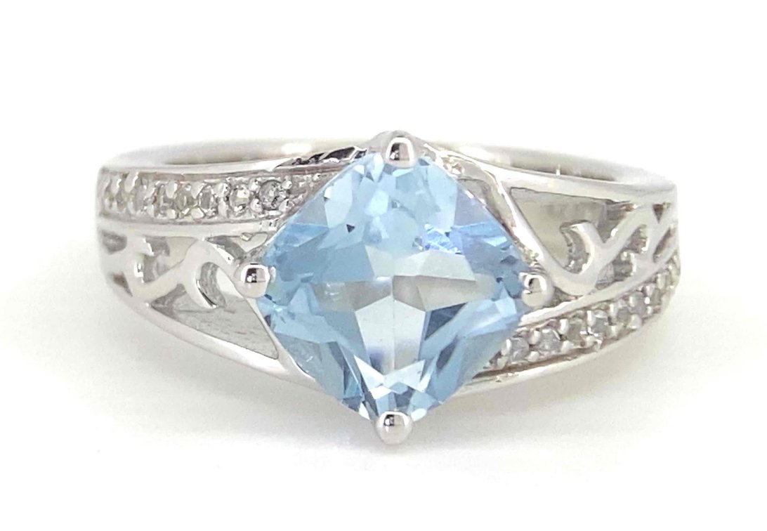 2.4 Carat Sky Blue Topaz With White Topaz Accent Stones