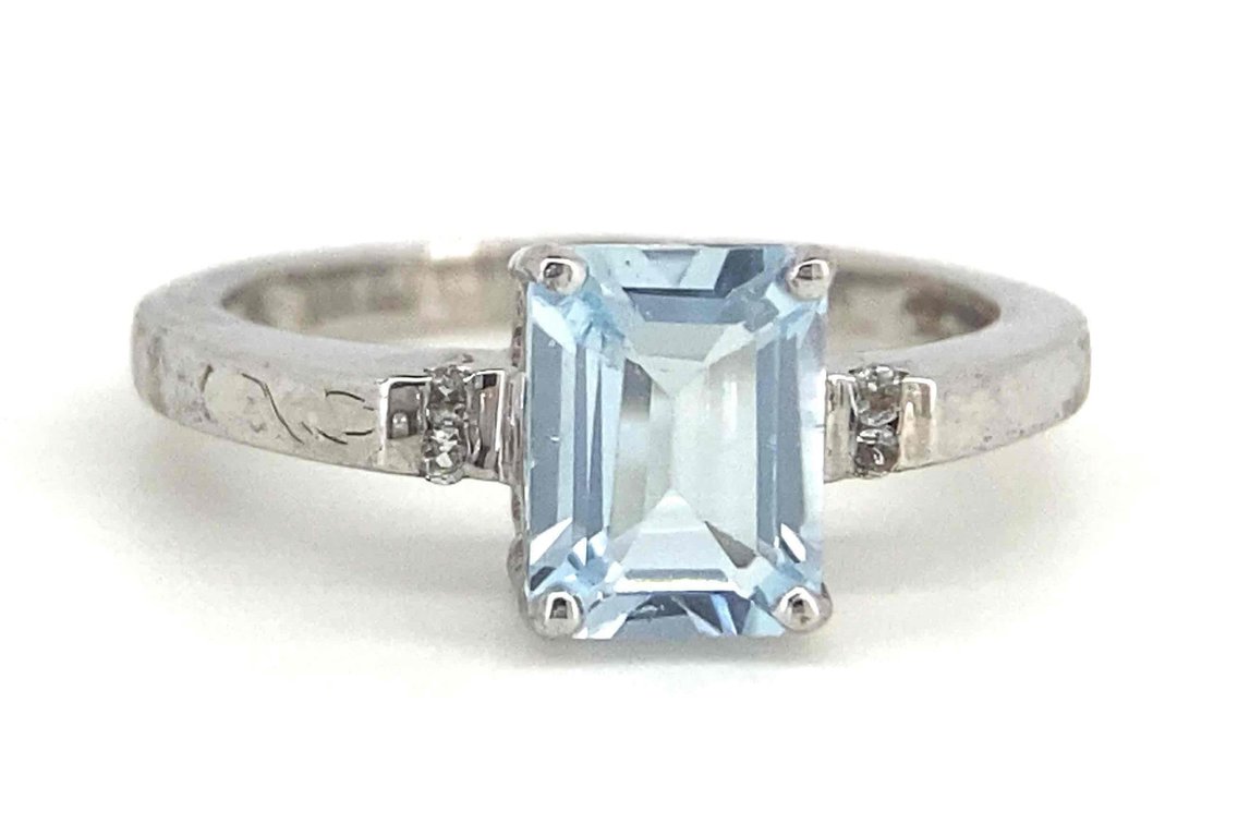 Over 1.5 Carat Blue Topaz Center Stone With White Topaz Side Stones Size 7
