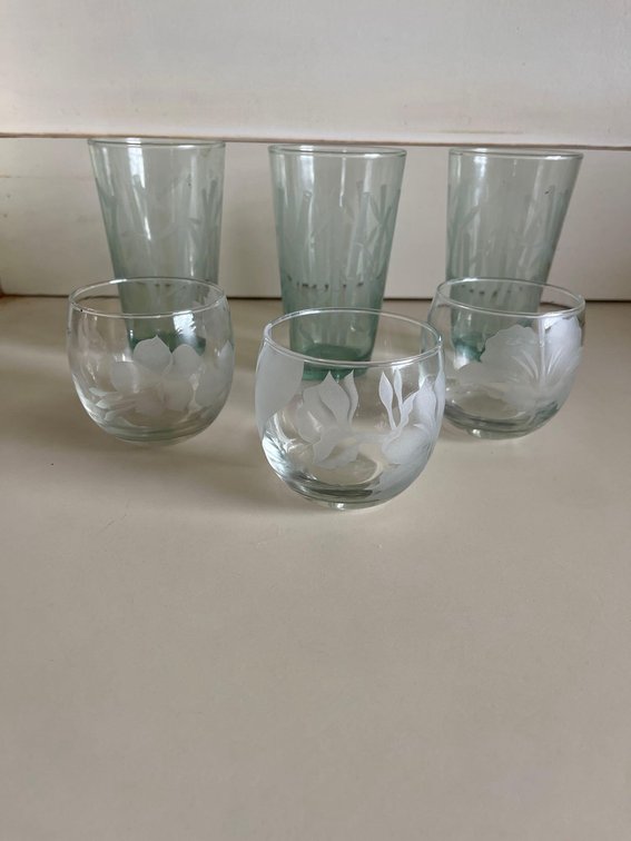 set of etched glasses/three bamboo pint glasses. Three floral juice glasses.