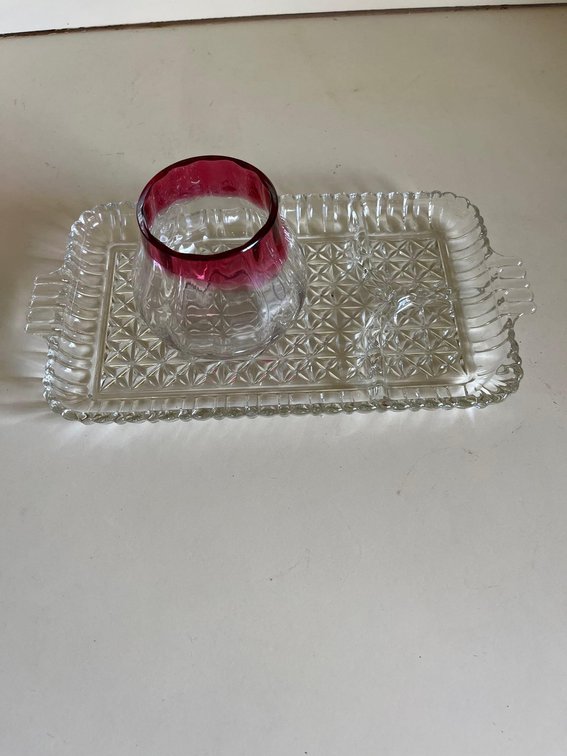 Glass serving tray with two sections with rose colored top vase