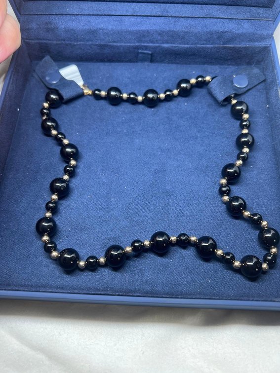 14k GOLD BEAD & BLACK ONYX with Letter of authenticity $899 at costco now