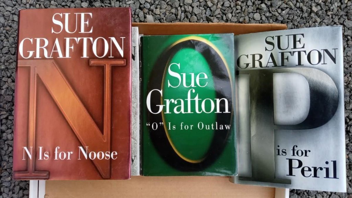 One (1) box Sue Grafton books - the Alphabet Murders
