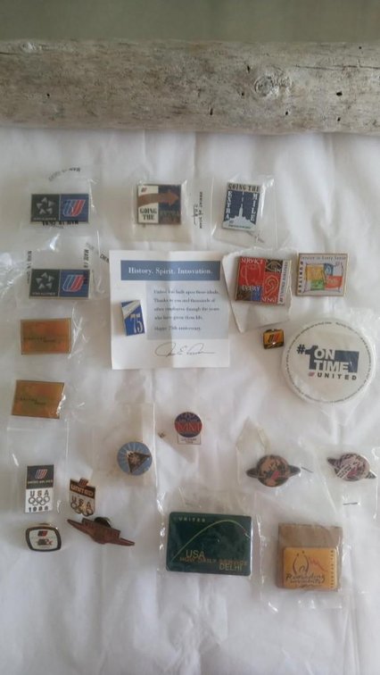 A collection of United Airlines collectible pins 