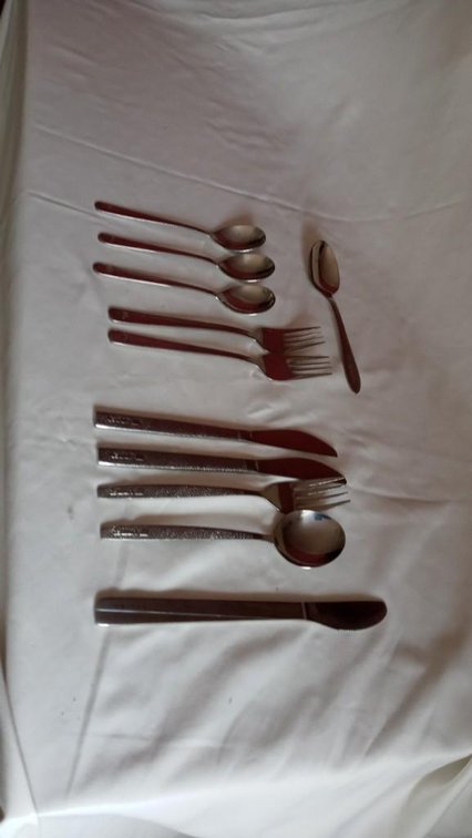 A collection of United Airlines/ Korean Air/ US Air silverware  