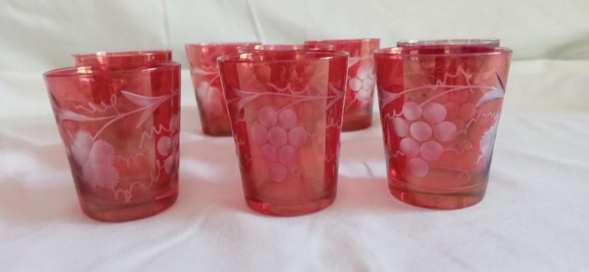 Six (6) Vintage Cranberry Glass Shot Glasses with etched grape and leaf pattern. Very pretty!